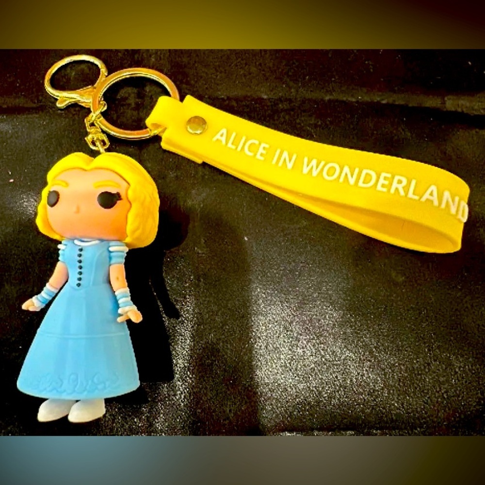 Disney Alice in Wonderland silicone keychain blue light​